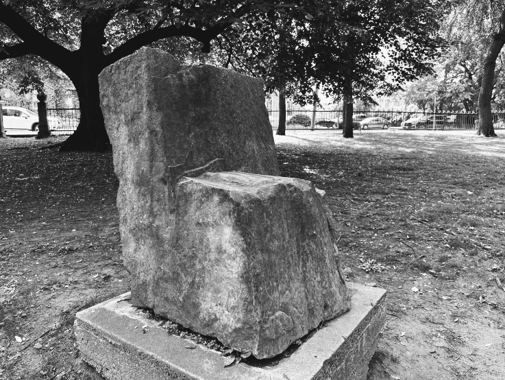 A stone shaped like a chair. It doesn't look like it was carved to be a chair. 